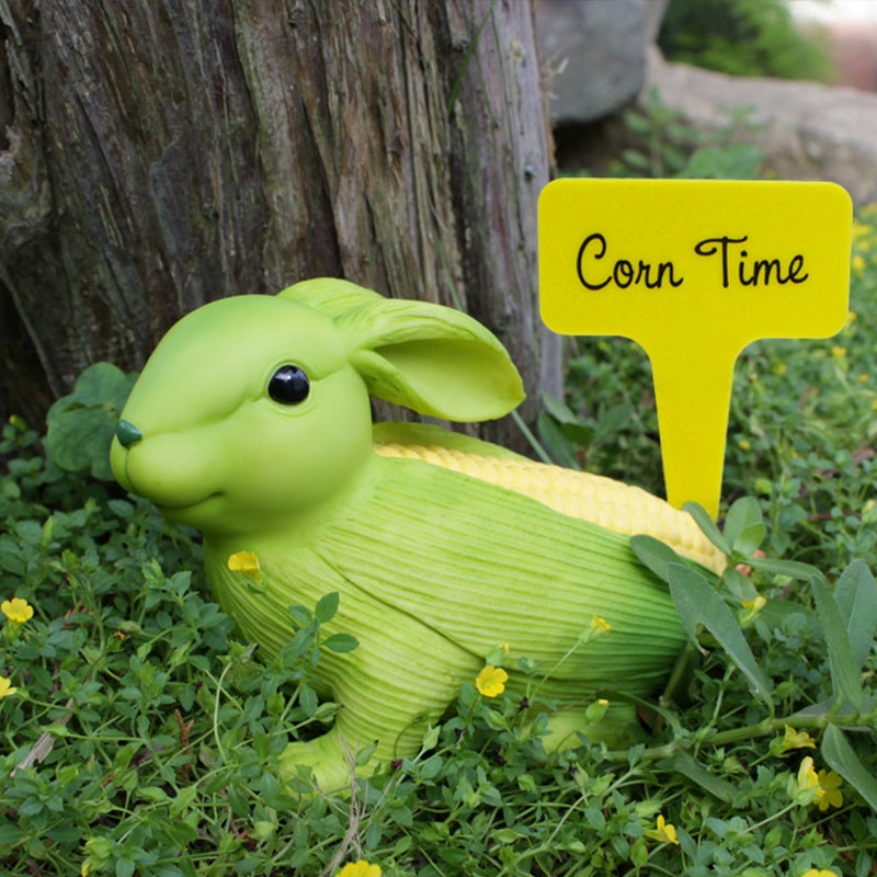 Green And Yellow Whimsical Resin Corn Rabbit Garden Statue – Unique Outdoor Yard Art Figurine with Decorative Sign